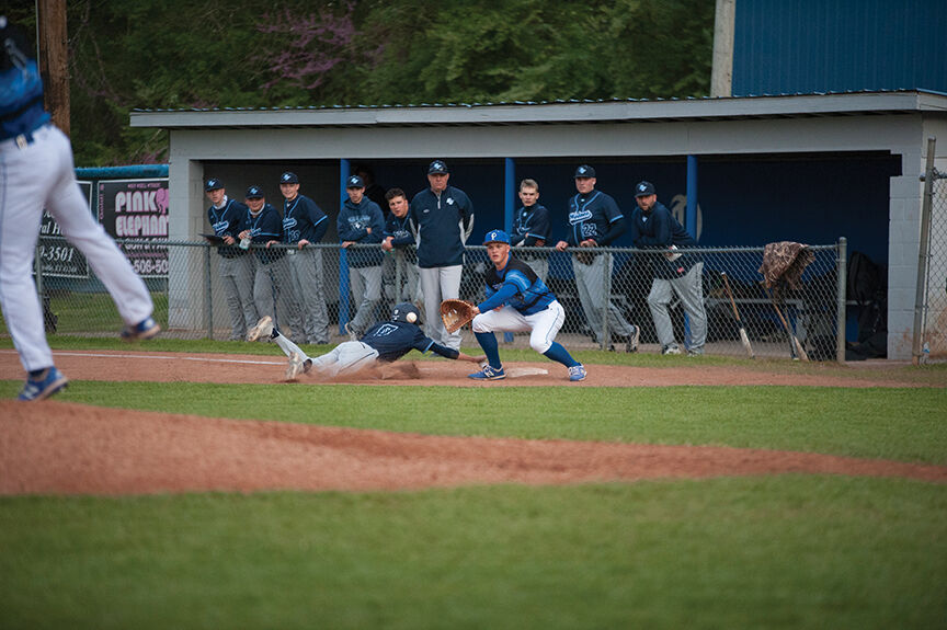 4-27 paint Griffin Collins preps to make a tag on a pick off move from Porter.jpg